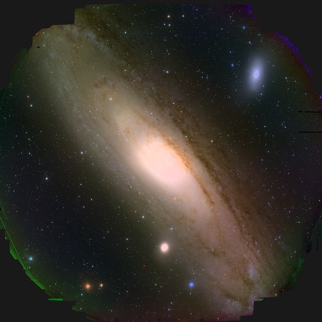 Figure 1: The full view of M31 taken by HSC. The HSC mounted on the Subaru Telescope can observe an extremely wide field of view, equal to 9 times the area of the full moon. In some parts at the edge region appear to be strange color since the boundary area of the image circle is hard to process&nbsp;and observed area is not perfectly coinciding between the 3 bands.&nbsp;(Credit: HSC Collaboration /&nbsp;Kavli IPMU)&nbsp;